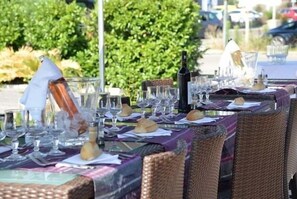 Breakfast, lunch, dinner served; local cuisine 