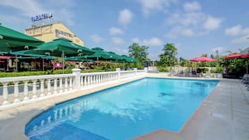 Seasonal outdoor pool, open 8:00 AM to 8:00 PM, sun loungers
