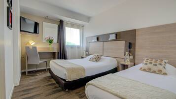 Trippelrum | Sängtillbehör av högsta kvalitet, skrivbord och gratis wi-fi