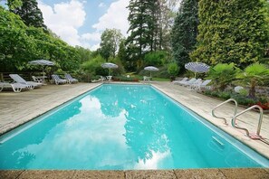 Indoor pool, outdoor pool, open 8:00 AM to 8:00 PM, pool loungers