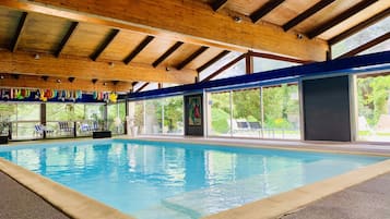 Indoor pool, outdoor pool, open 8:00 AM to 8:00 PM, pool loungers