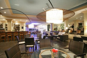 2 bars/lounges, poolside bar, beach bar