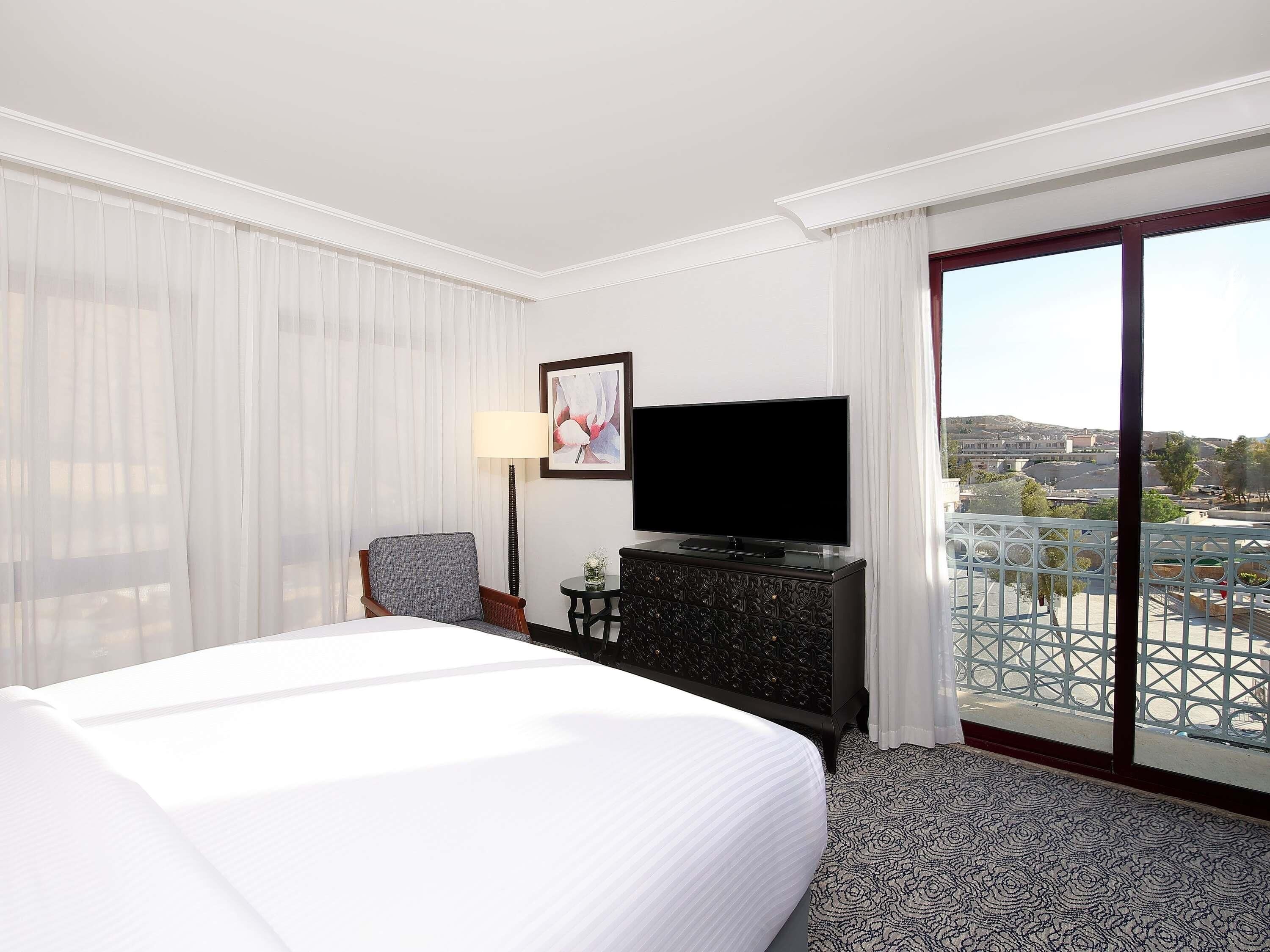 Hypo-allergenic bedding, free minibar, in-room safe