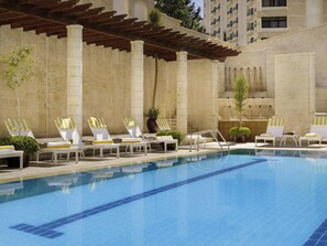 Outdoor pool, open 6:00 AM to 10:00 PM, pool umbrellas, sun loungers - Mövenpick Resort Petra (Wadi Musa)