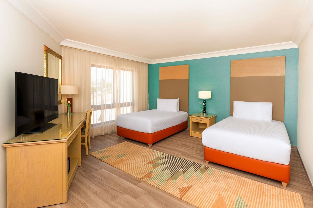 Hypo-allergenic bedding available, minibar (free items), in-room safe