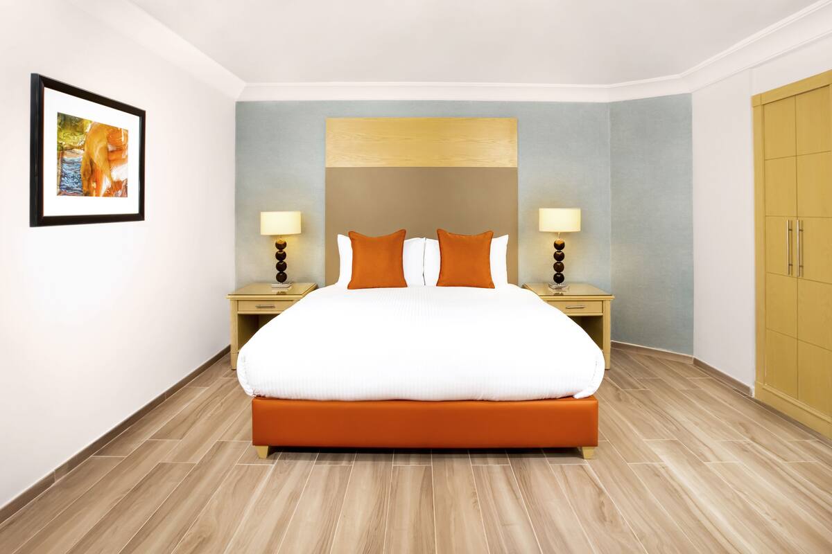 junior suite, 1 king bed | bathroom | shower, eco-friendly toiletries, hair dryer, bathrobes