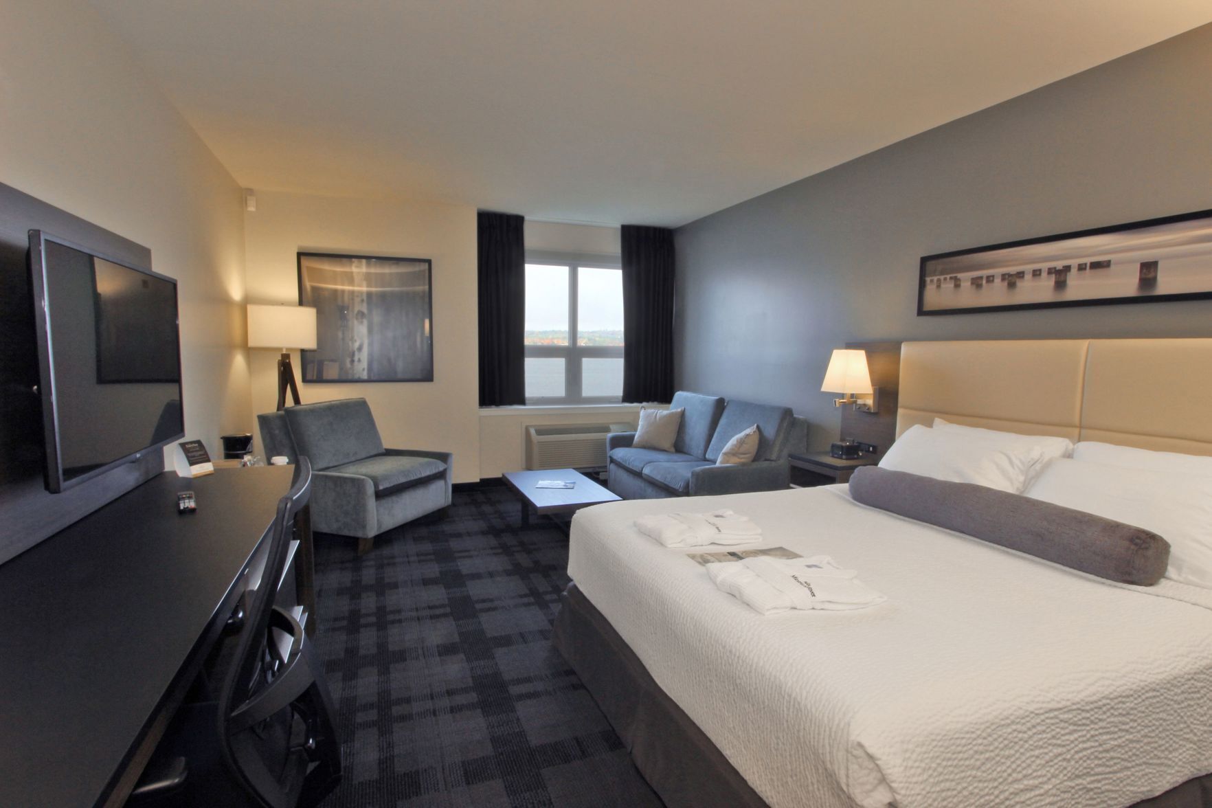 Premium bedding, down comforters, desk, laptop workspace