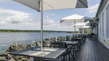 Breakfast, lunch, dinner served; local cuisine, al fresco dining