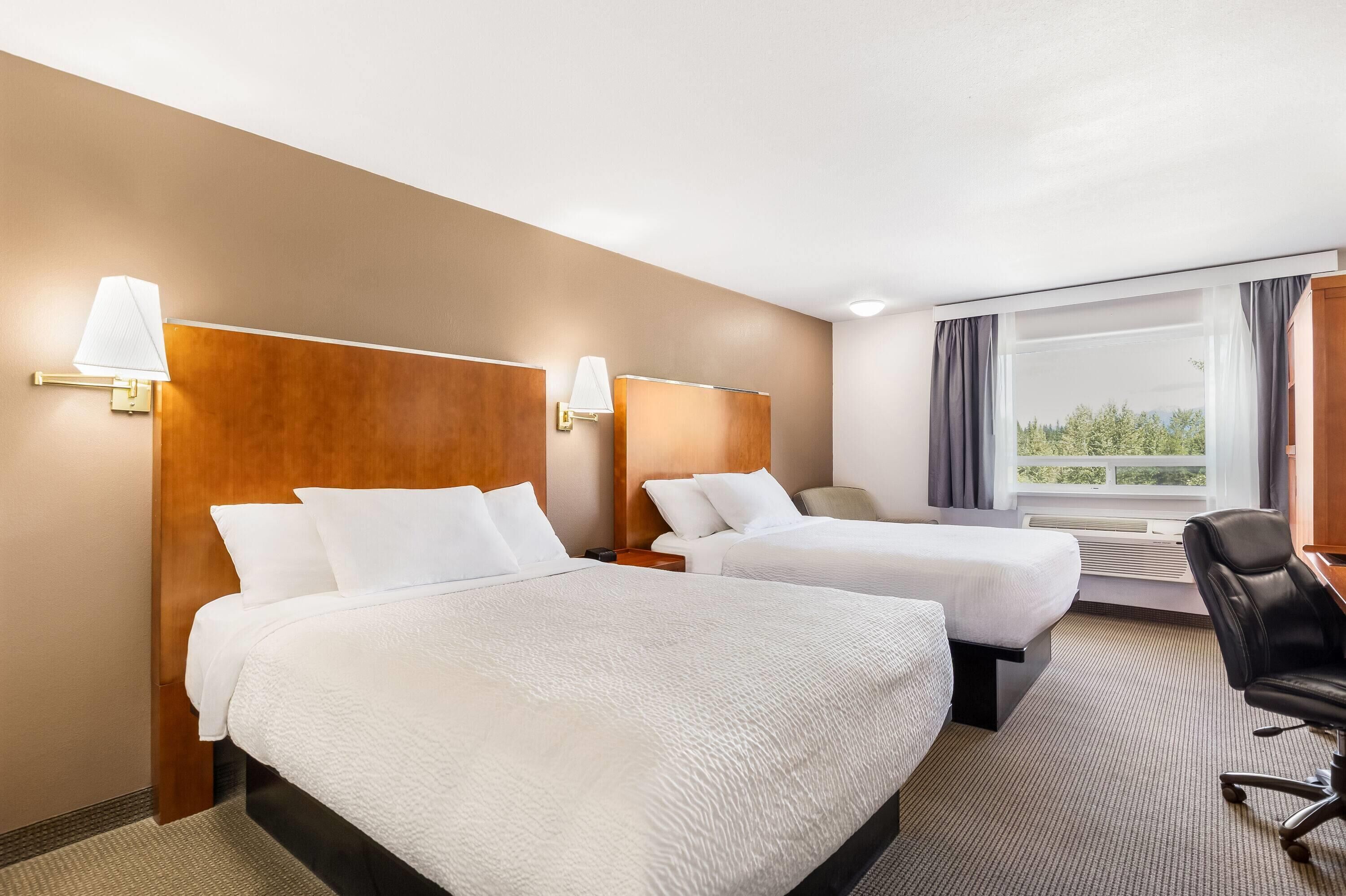 Room, 2 Queen Beds, Non Smoking | In-room safe, desk, iron/ironing board, free WiFi