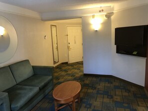 Suite, 1 King Bed, Non Smoking | Living area | 50-inch flat-screen TV with cable channels, TV