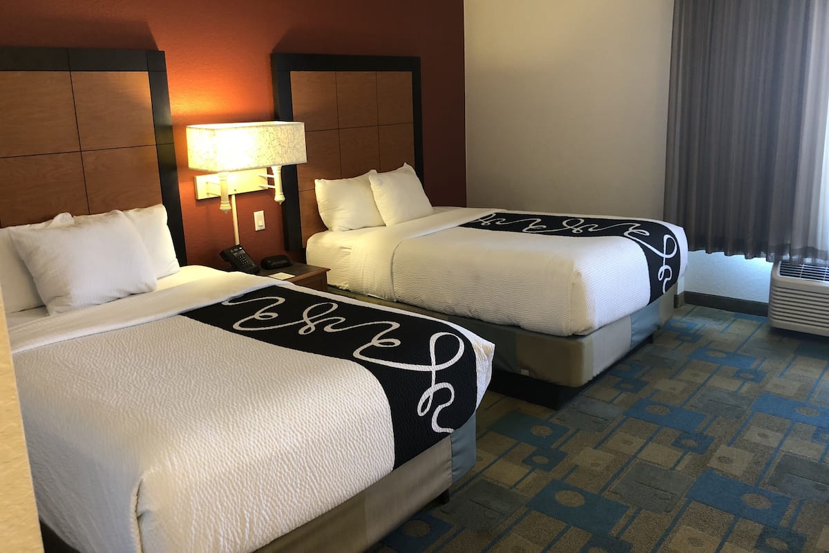 Room, 2 Double Beds, Non Smoking | Pillow-top beds, desk, iron/ironing board, free cots/infant beds