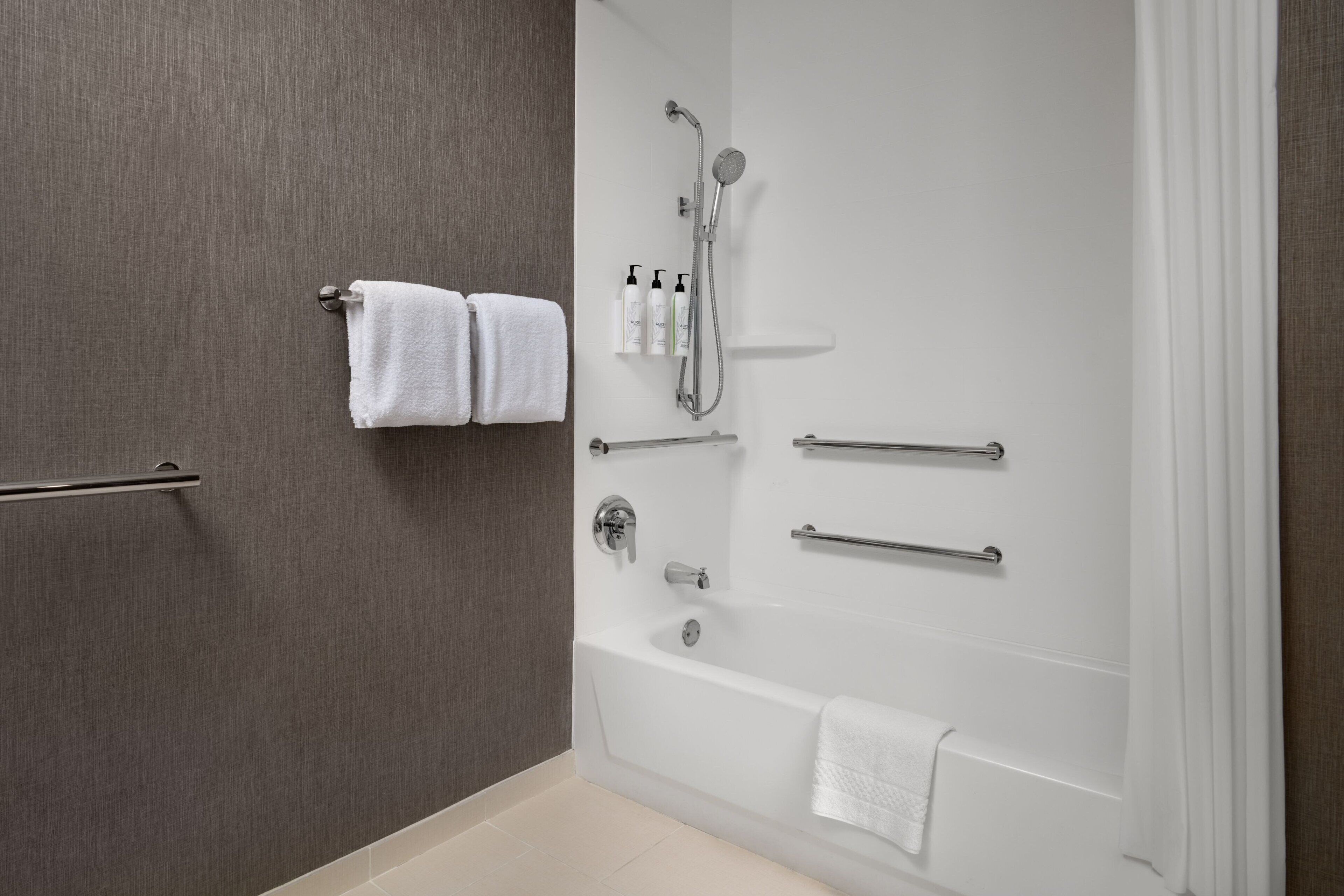 suite, 1 king bed with sofa bed, non smoking | bathroom | hair dryer, towels