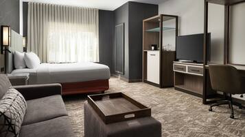 Desk, blackout drapes, iron/ironing board, free cribs/infant beds