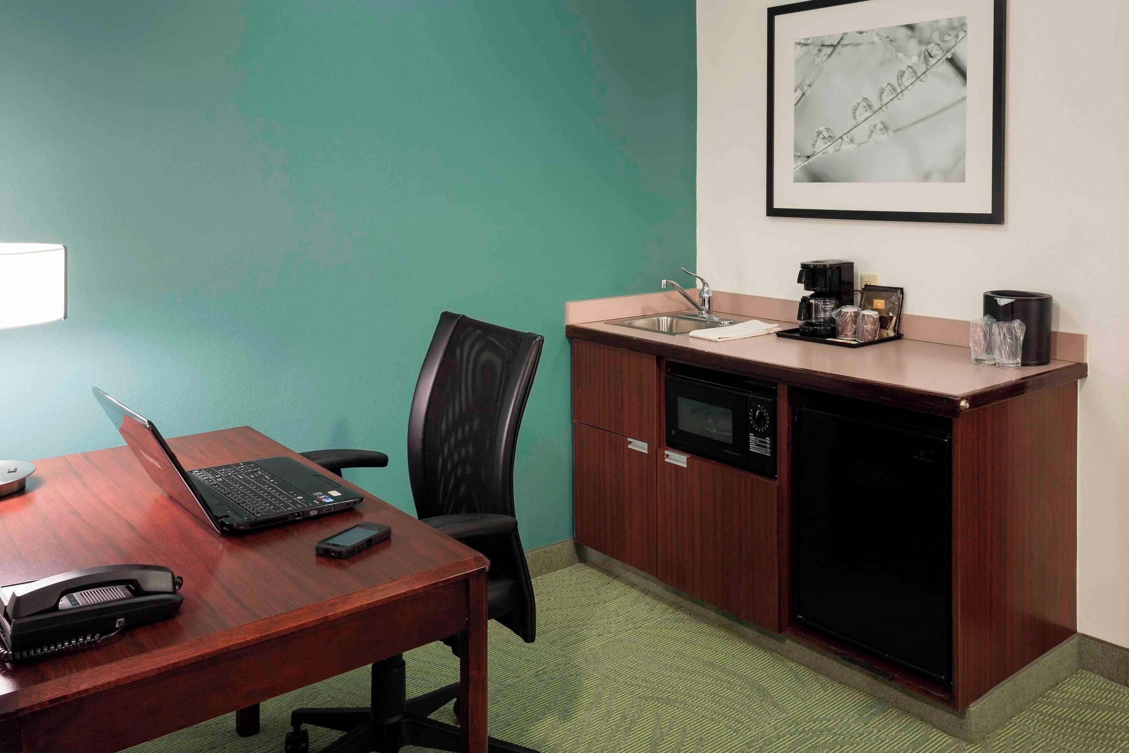 desk, blackout curtains, iron/ironing board, free cots/infant beds