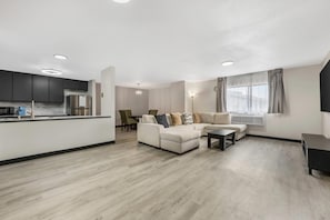 Suite, 1 King Bed with Sofa bed, Non Smoking (Efficiency, Upgrade) | Desk, blackout drapes, iron/ironing board, free cribs/infant beds