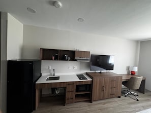 Desk, blackout curtains, iron/ironing board, free cots/infant beds