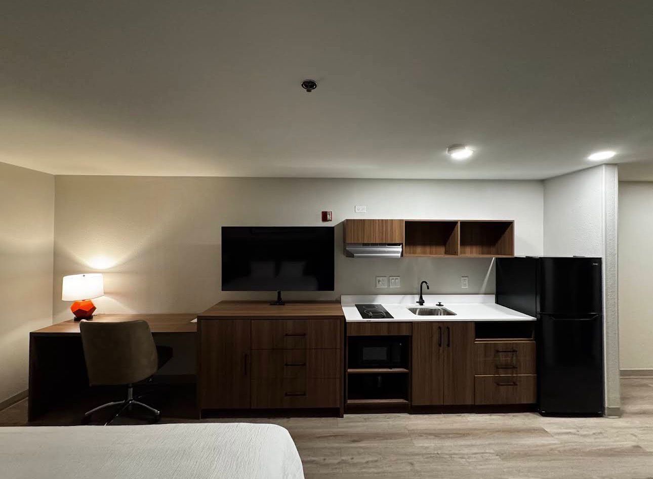 Desk, blackout drapes, iron/ironing board, free cribs/infant beds