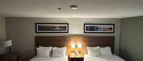 Desk, blackout drapes, iron/ironing board, free cribs/infant beds