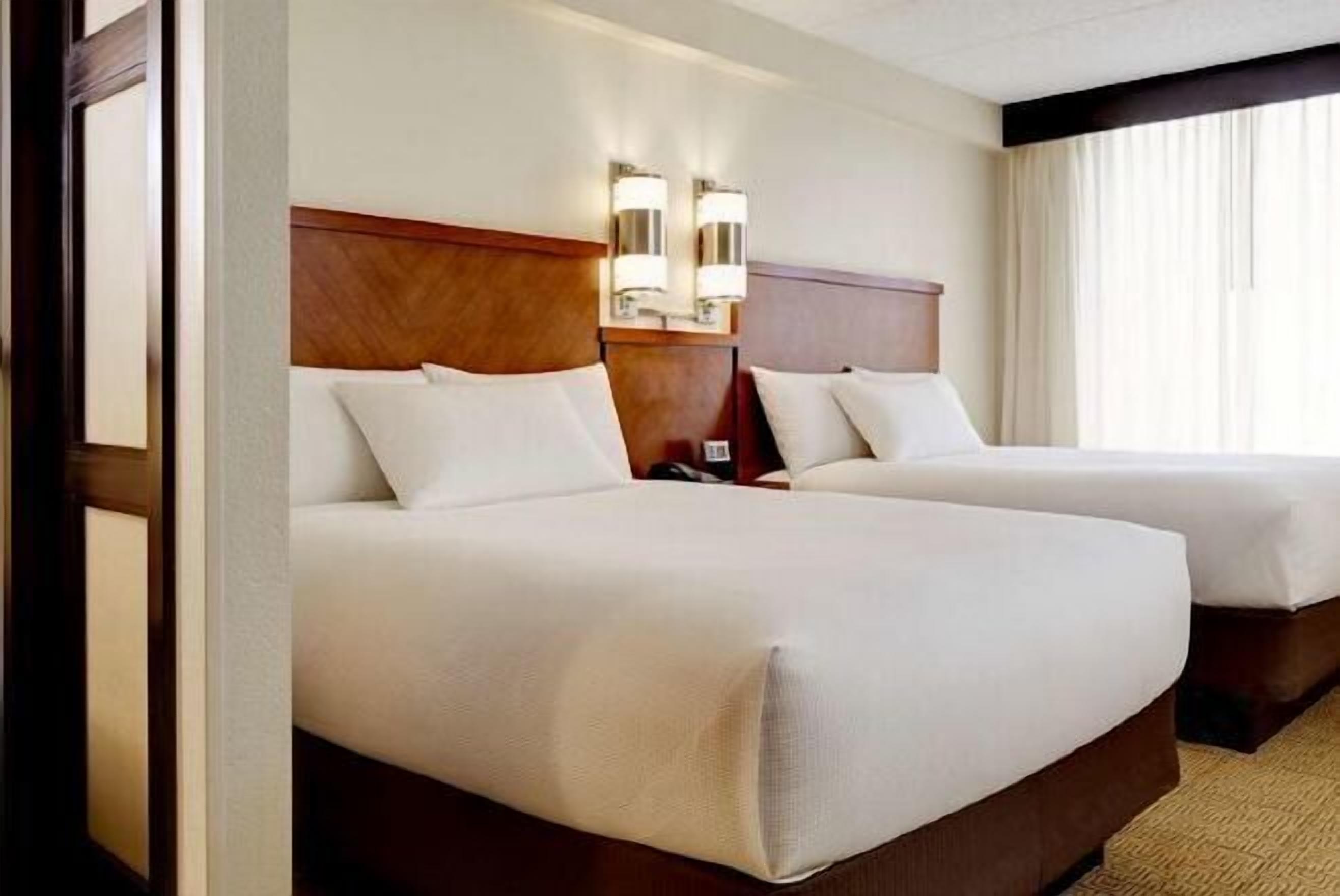 Premium bedding, down duvets, in-room safe, desk