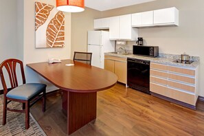 Full-sized fridge, microwave, stovetop, dishwasher