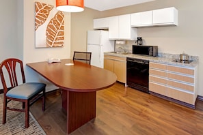 Full-sized fridge, microwave, stovetop, dishwasher