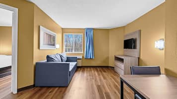 Suite, Non Smoking (1 Queen Bed) | Desk, laptop workspace, blackout curtains, iron/ironing board