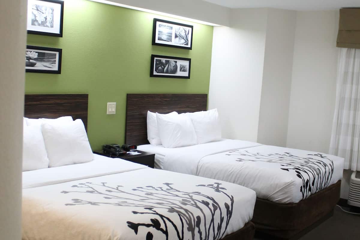 standard room, 2 queen beds, non smoking | desk, blackout curtains, iron/ironing board, free cots/infant beds