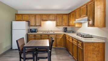 Suite, 1 King Bed, Non Smoking, Kitchenette (with Sofabed) | Private kitchenette | Fridge, microwave, coffee/tea maker