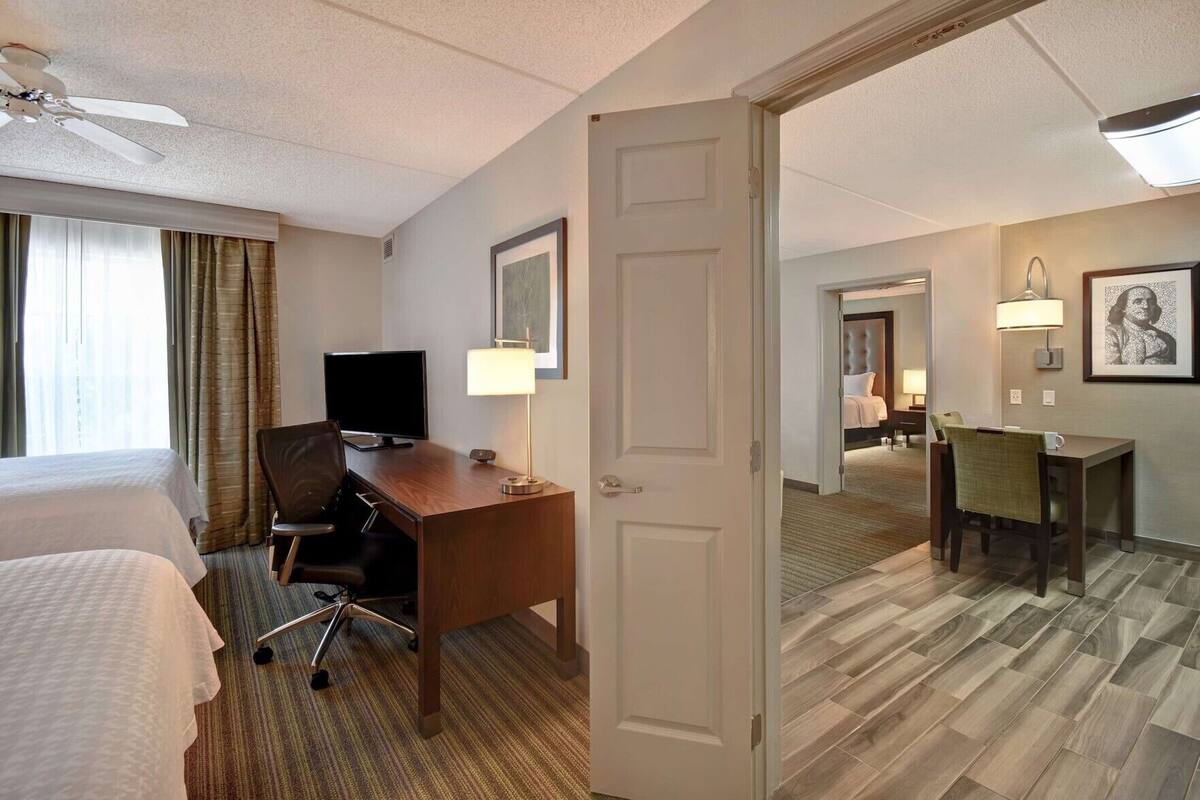 In-room safe, desk, iron/ironing board, cribs (free)