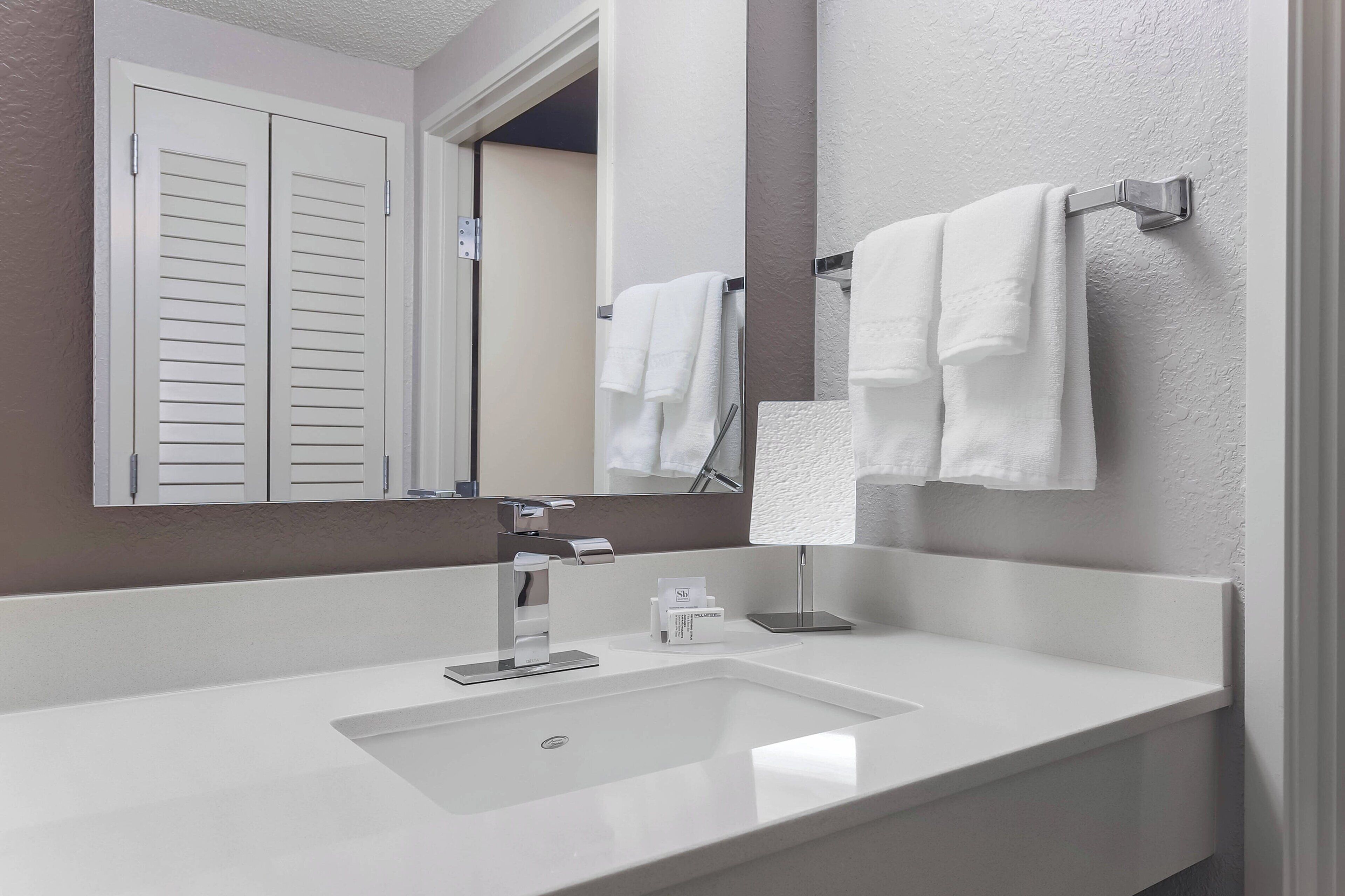 combined shower/bathtub, free toiletries, hair dryer, towels