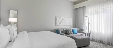 Luxe beddengoed, een kluis op de kamer, een bureau