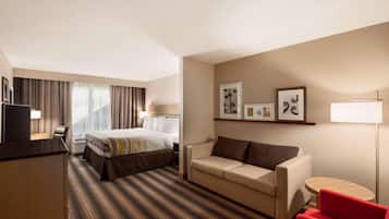 Premium bedding, desk, laptop workspace, blackout curtains