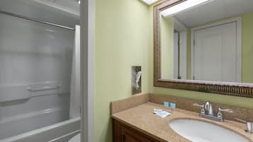 Combined shower/tub, deep soaking tub, free toiletries, hair dryer