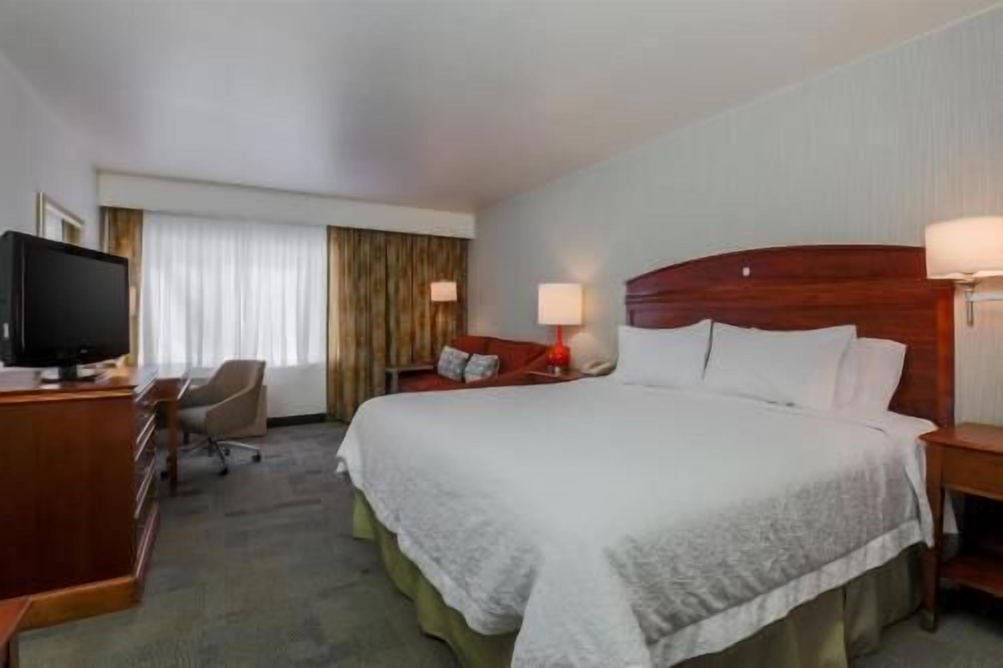 Pillowtop beds, desk, blackout drapes, iron/ironing board