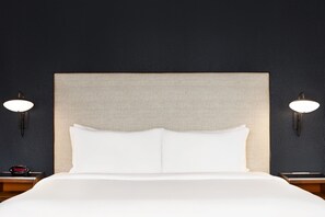 Premium bedding, down comforters, pillowtop beds, in-room safe