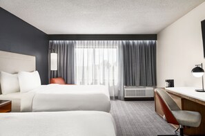 Premium bedding, down duvets, pillow-top beds, in-room safe