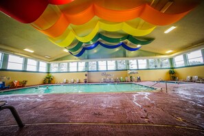 Indoor pool, open 7:00 AM to 9:00 PM, pool loungers