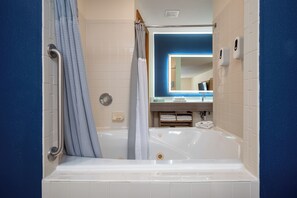 Basic Room, 1 King Bed, Jetted Tub | Bathroom | Free toiletries, hair dryer, towels, soap