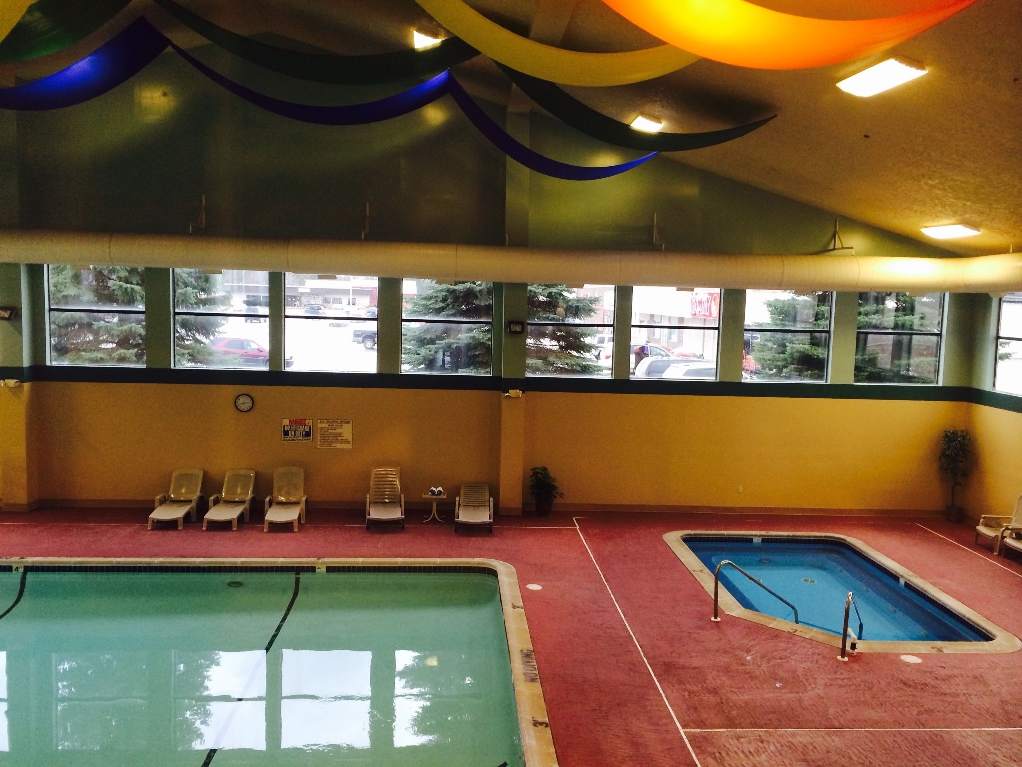 indoor pool, open 7:00 am to 9:00 pm, pool loungers