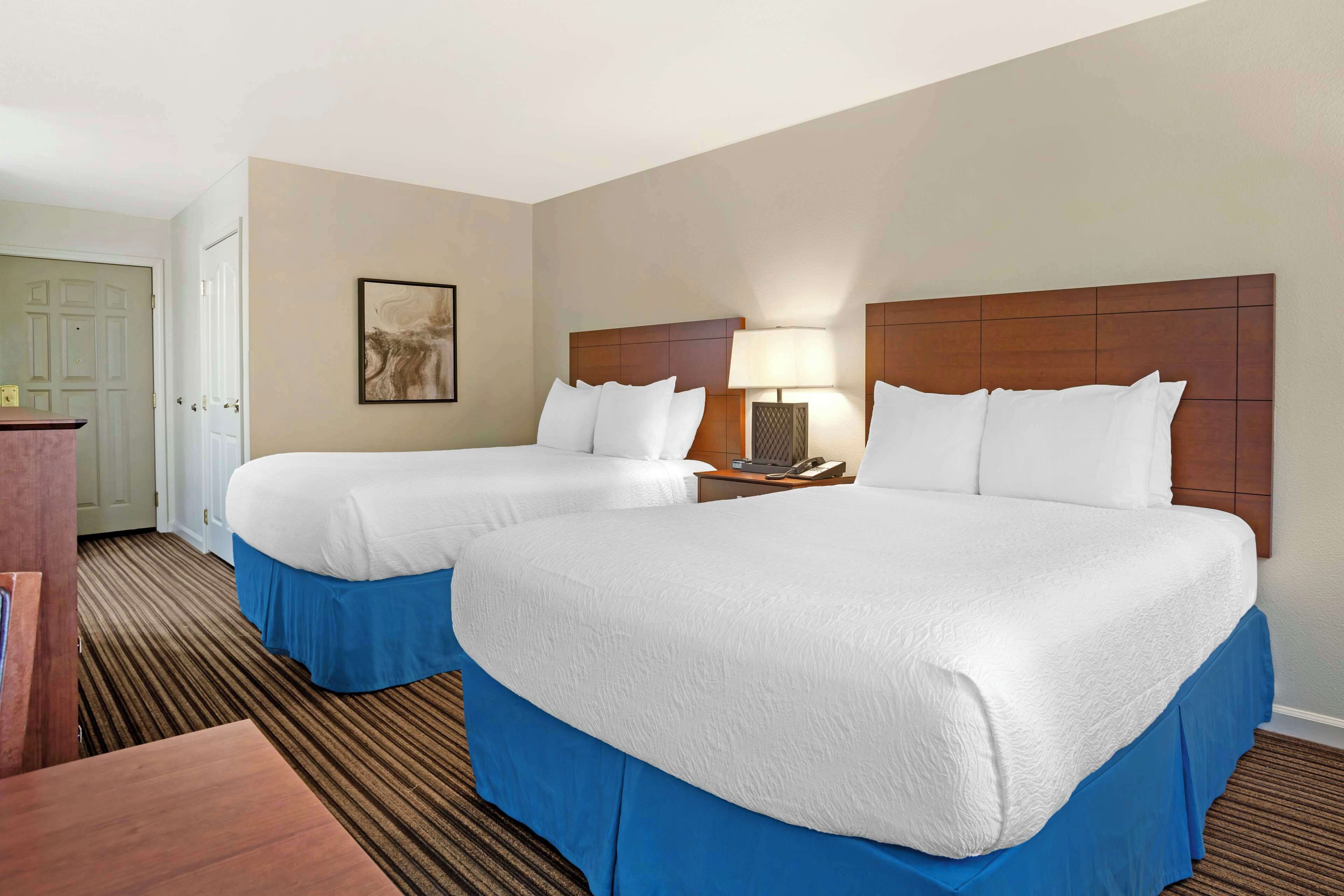 standard room, 2 queen beds, non smoking, refrigerator & microwave | desk, iron/ironing board, internet, bed sheets