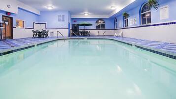 Indoor pool, open 7 AM to 11 PM, pool umbrellas, sun loungers