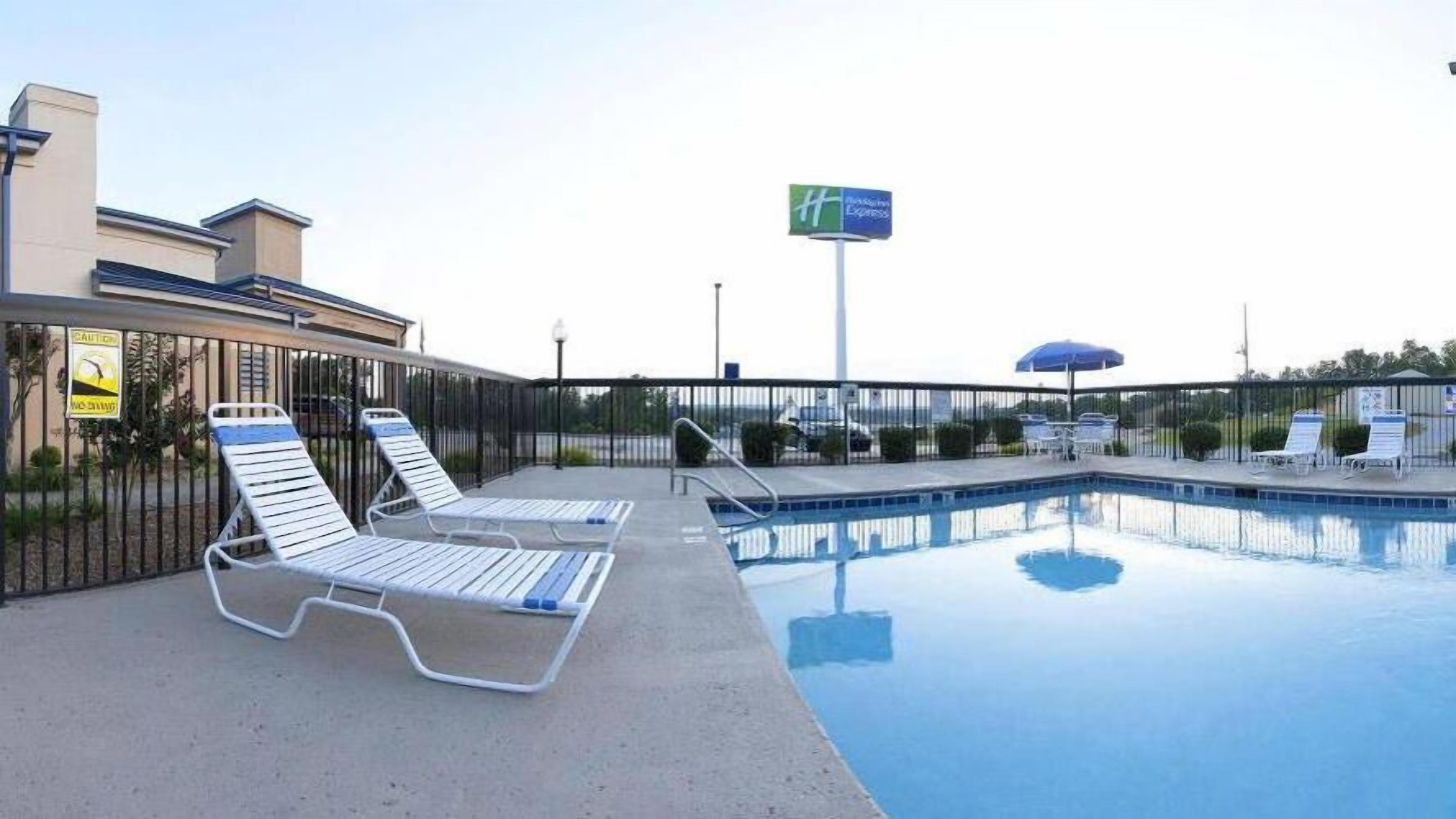 seasonal outdoor pool, open 11 am to 11 pm, pool loungers