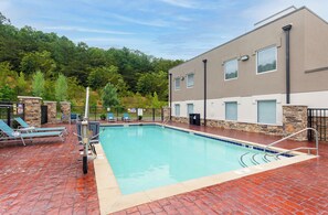 Seasonal outdoor pool, open 11 AM to 11 PM, sun loungers