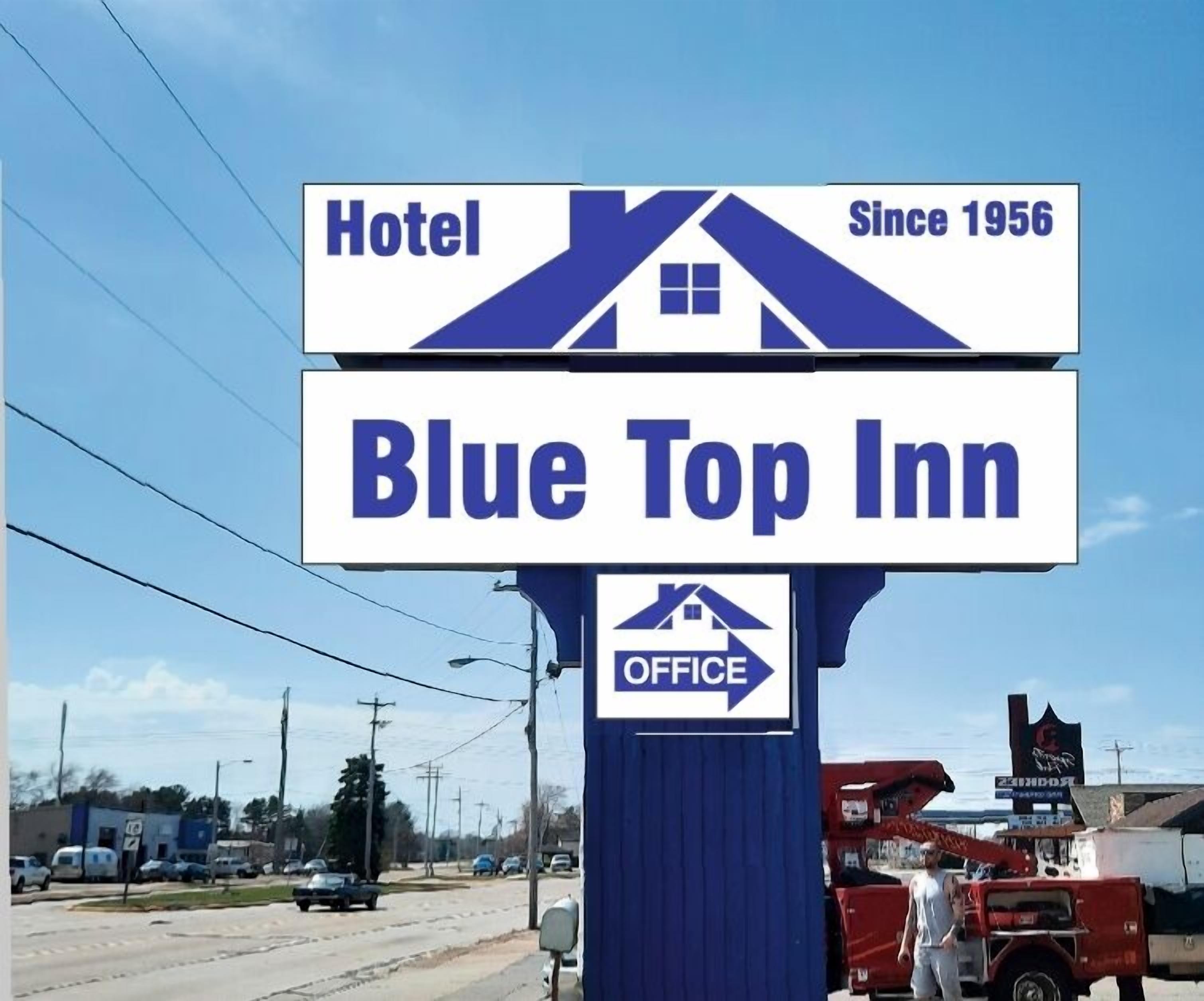 A hotel sign for Blue Top Inn, indicating it has been in operation since 1956.
