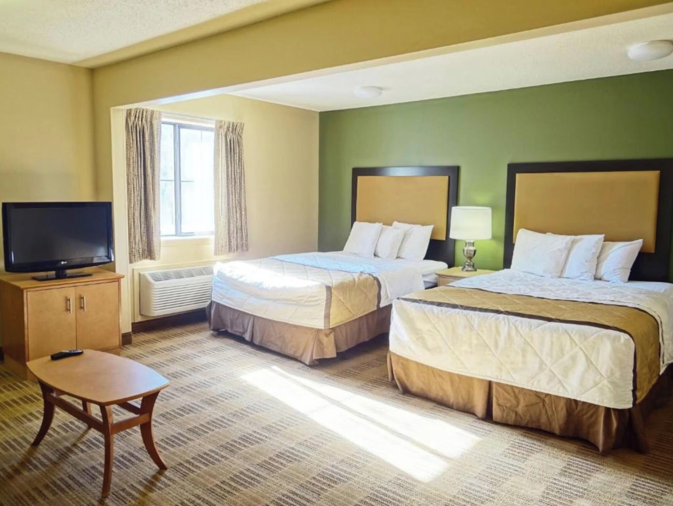 Suite, 2 queensize bedden, niet-roken, keuken | Een bureau, een strijkplank/strijkijzer, gratis wifi, beddengoed