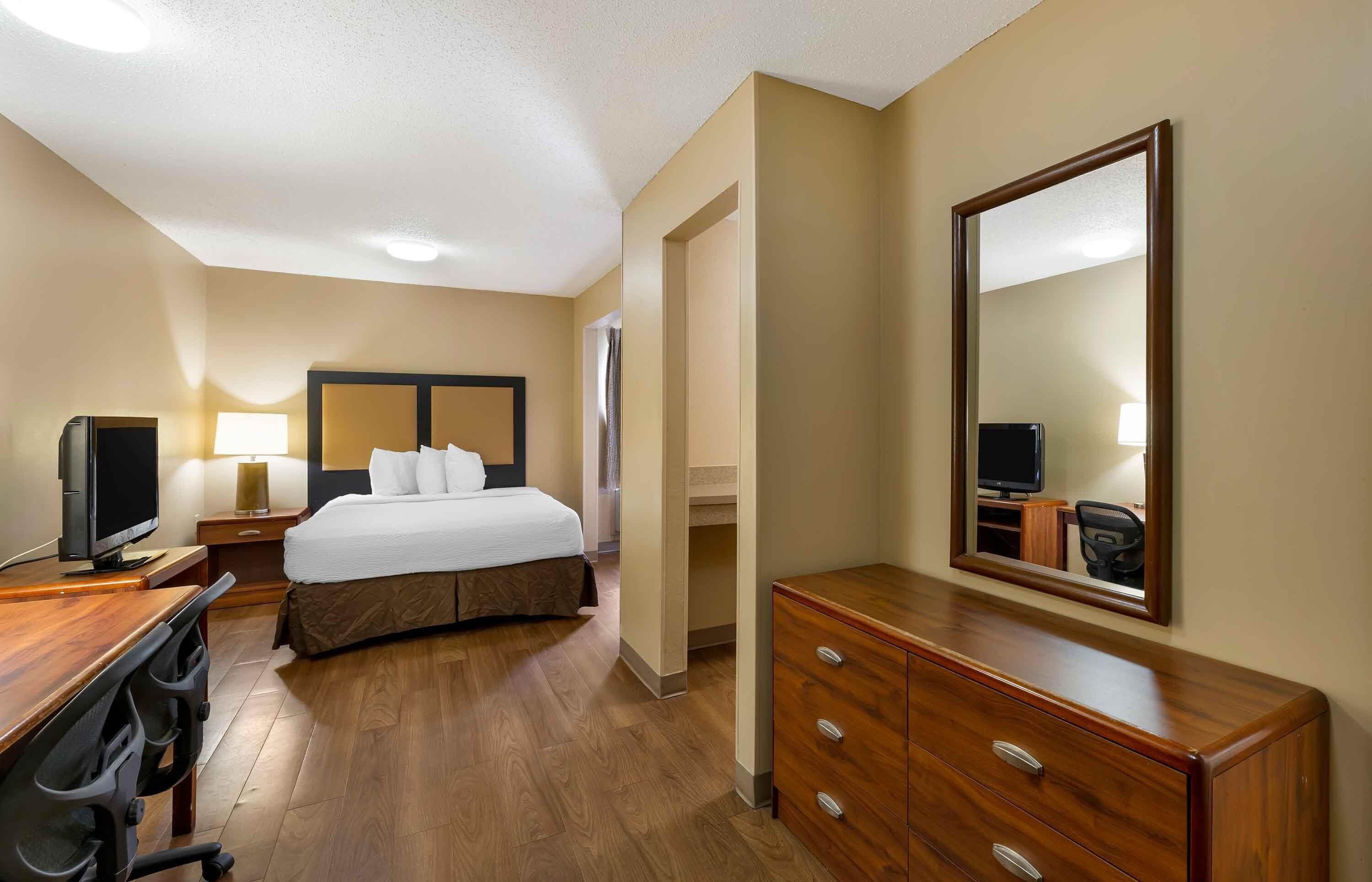 Pillow-top beds, desk, laptop workspace, blackout curtains