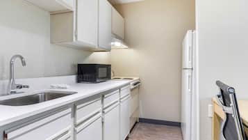 Studio, 1 Queen Bed, Non Smoking | Private kitchen | Full-size fridge, microwave, stovetop, coffee/tea maker