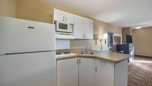 Coffee/tea maker, full-size fridge, microwave, stovetop - Suburban Studios (Oklahoma City)