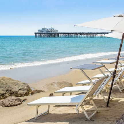 Private beach, white sand, sun loungers, beach umbrellas
