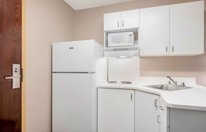 Studio, 1 King Bed, Non Smoking | Private kitchen | Fridge, microwave, stovetop, coffee/tea maker